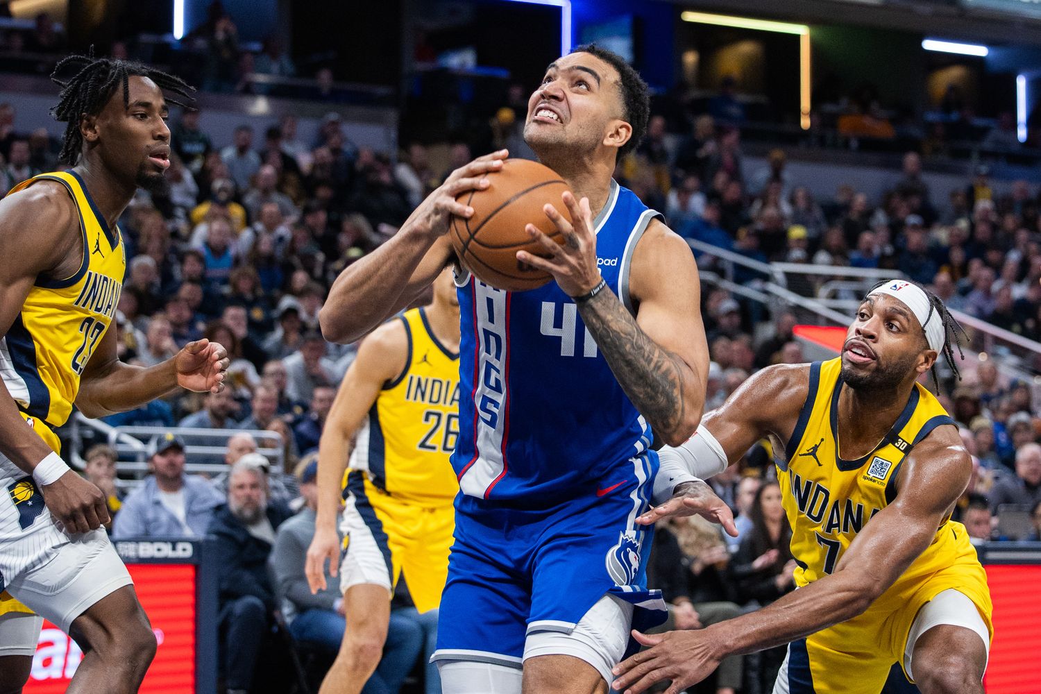 Feb 2, 2024; Indianapolis, Indiana, USA; Sacramento Kings forward Trey Lyles (41) shoots the ball while Indiana Pacers guard Buddy Hield (7) defends in the second half at Gainbridge Fieldhouse. Mandatory Credit: Trevor Ruszkowski-USA TODAY Sports  